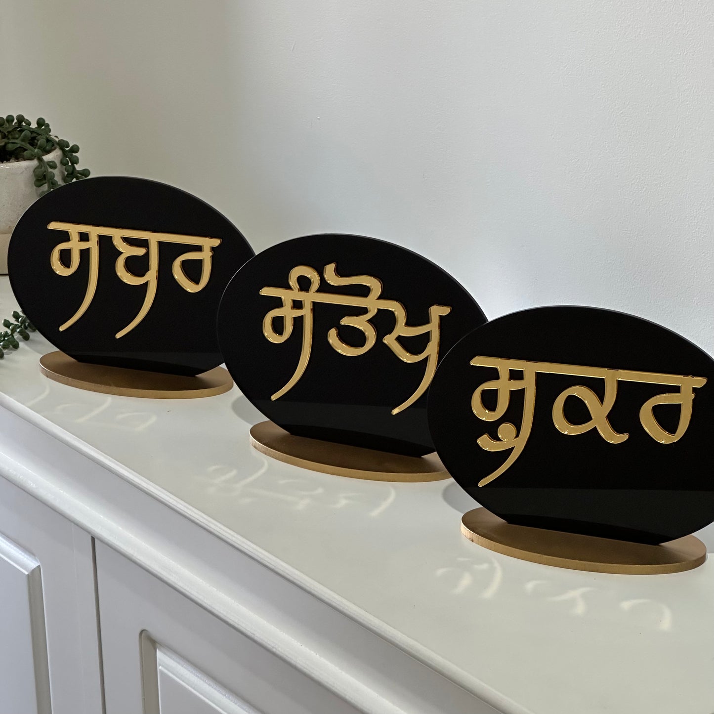 Sabar, Shukar & Santokh Console Decor