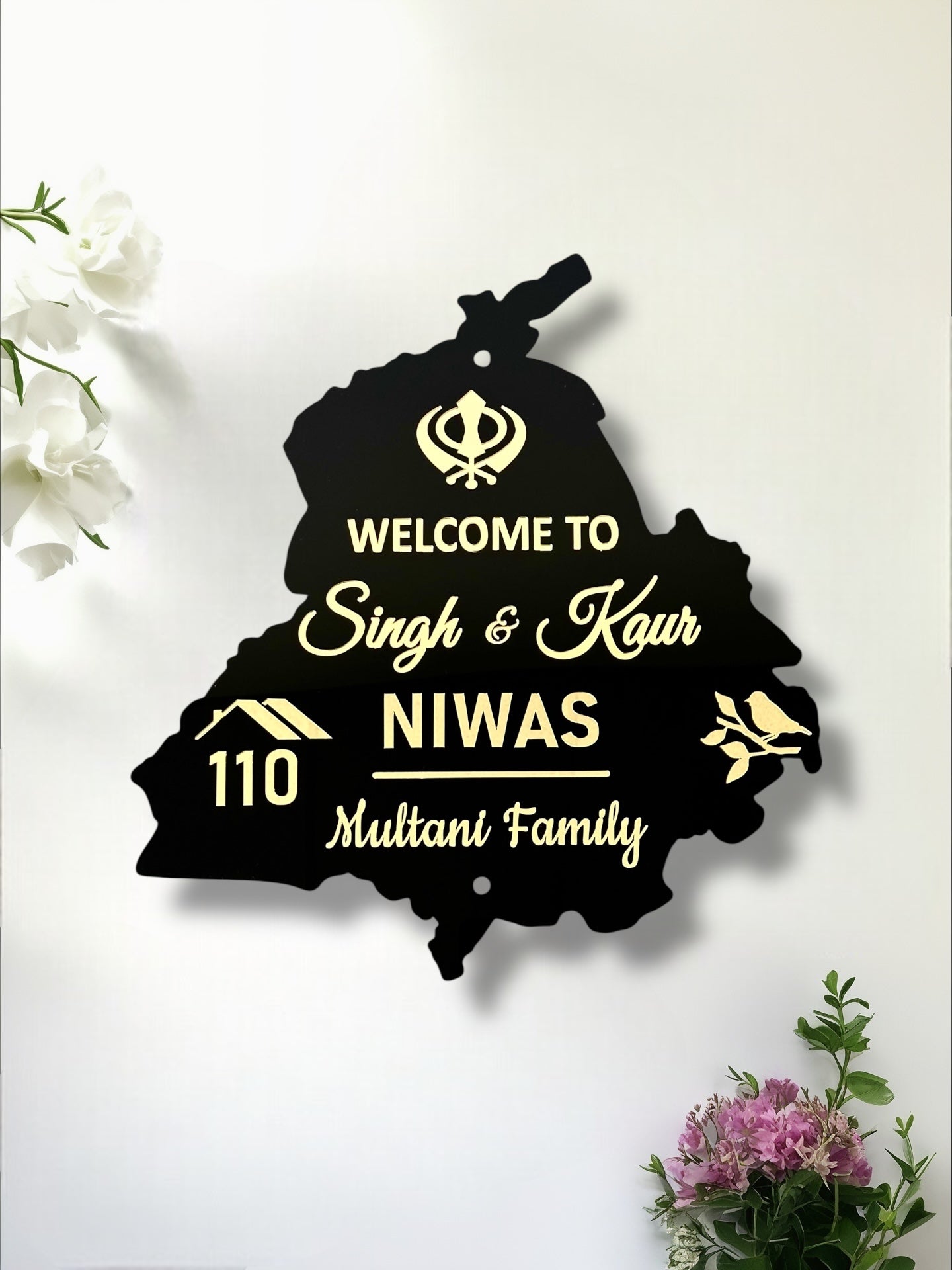Singh & Kaur Sign with Family Name